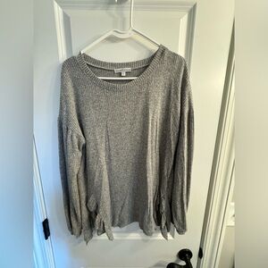 Oversized gray long sleeve sweater, ruffled cutouts on the side